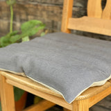 Tumši pelēka/dabīgi pelēka, raupja lina krēsla spilvens - paliktnis