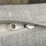 Mini rullīši ar gaiši pelēkām nekrāsota lina spilvendrānām, griķu sēnalu spilveni