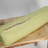 Gaiši zaļš mīkstināta lina vidējais griķu spilvens - rullītis - pagalvītis