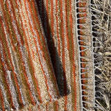 Oranžas, bēšas, sinepju toņa svītriņas, vilnas auduma grīdceliņš ~70x100cm