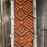 Oranži/brūna aitas vilnas sega ar indiāņu stila ornamentiem