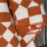 Oranži/balta aitas vilnas sega