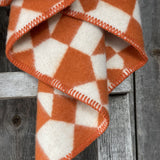 Oranži/balta aitas vilnas sega