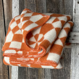 Oranži/balta aitas vilnas sega