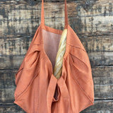 Oranža toņa lielā lina auduma iepirkumu soma - maiss