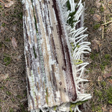 Krāsains vilnas auduma grīdceliņš ar rotaļīgām bārkstīm