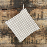 Lina un vatelīna karstuma paliktnis ar dabīgi pelēkām/baltām rūtiņām